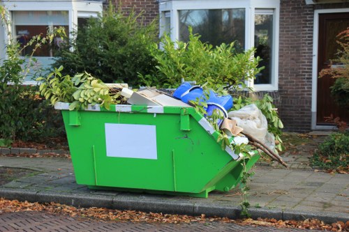 Workers sorting builders waste materials